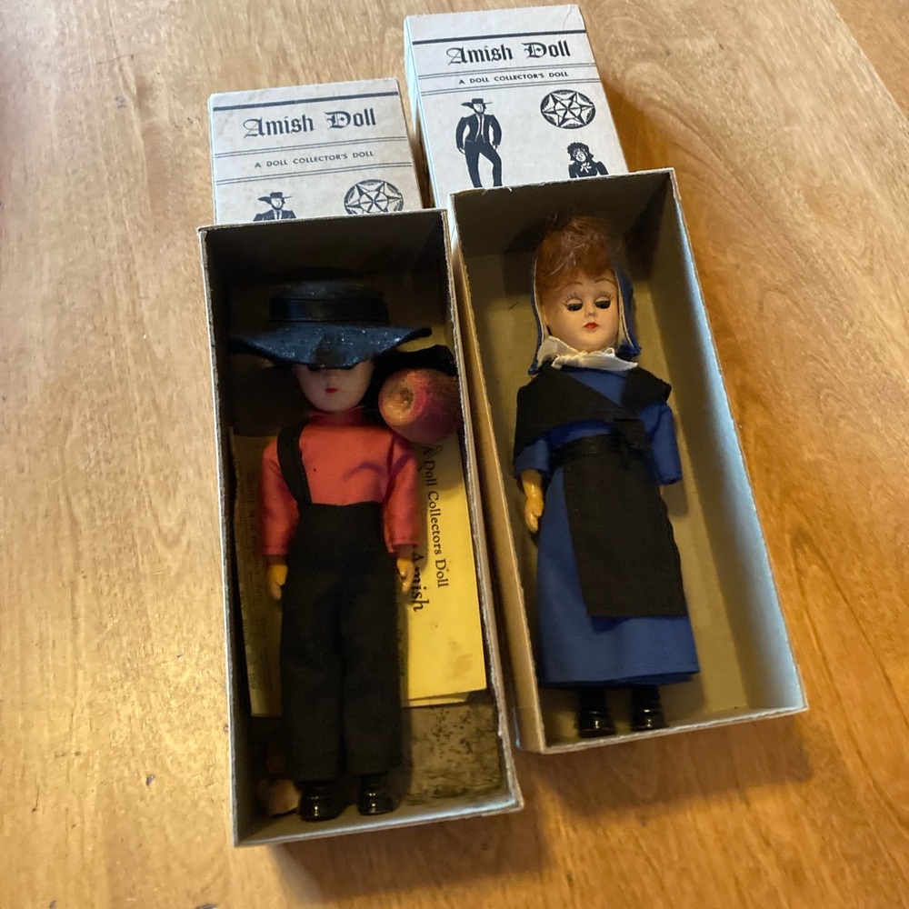 Two vintage Amish dolls in boxes